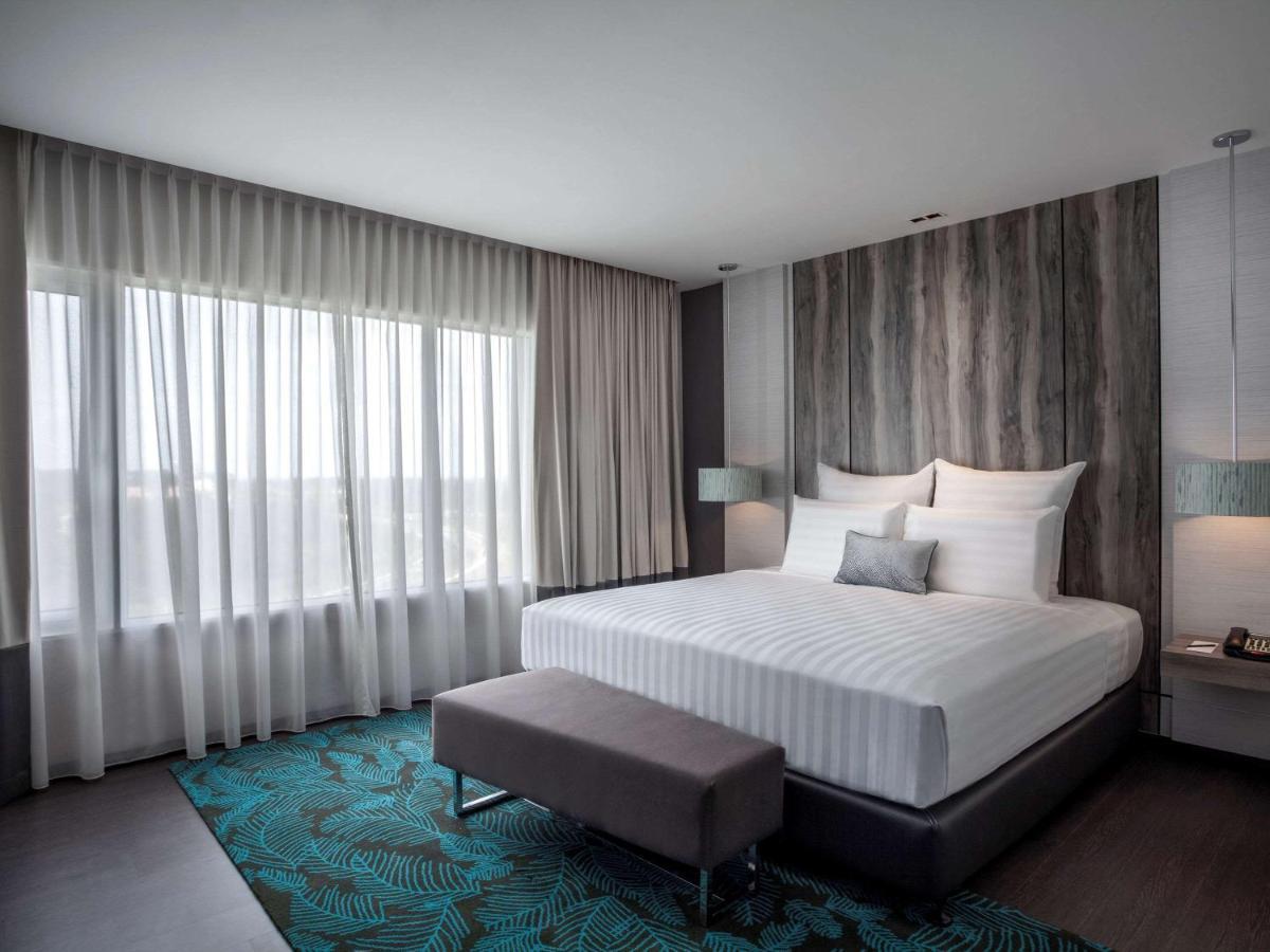 พูลแมน มิริ วอเตอร์ฟรอนต์ Hotel มีรี ภายนอก รูปภาพ A bedroom at the hotel